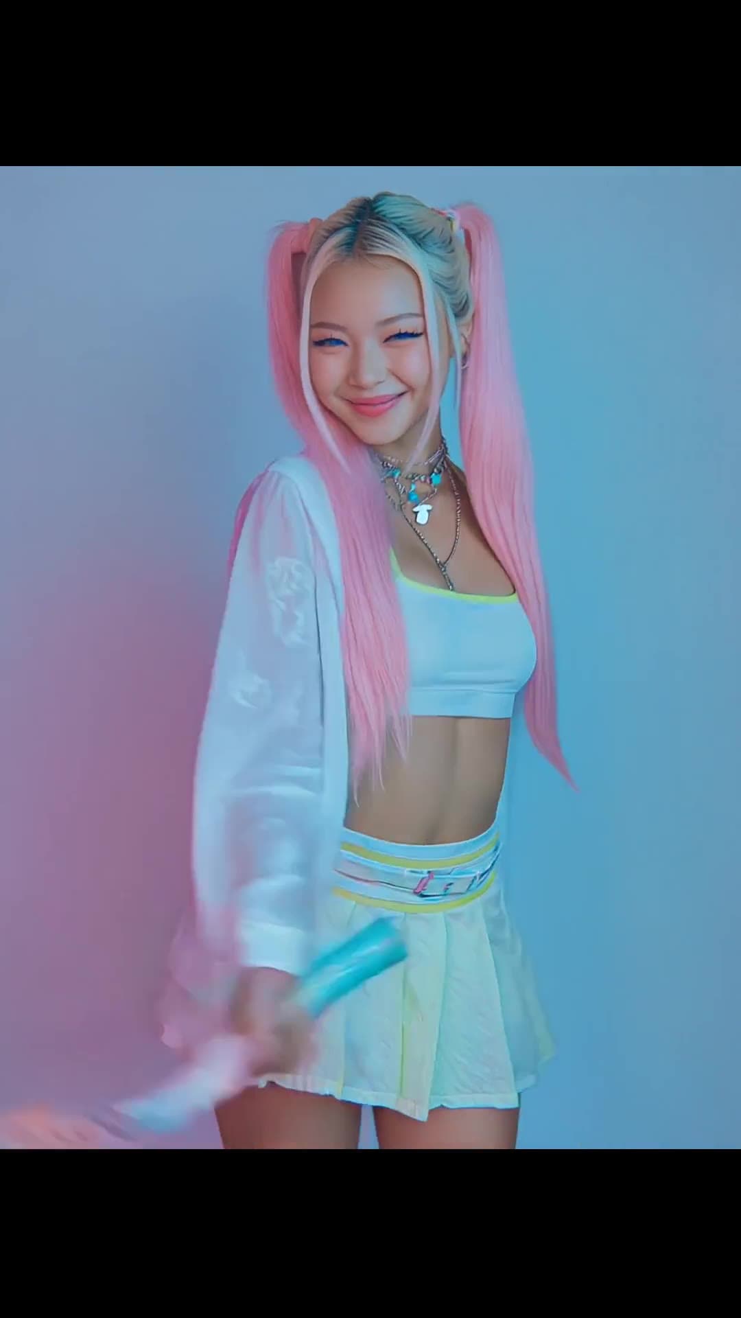 Pink pigtails blue eyes studio smile