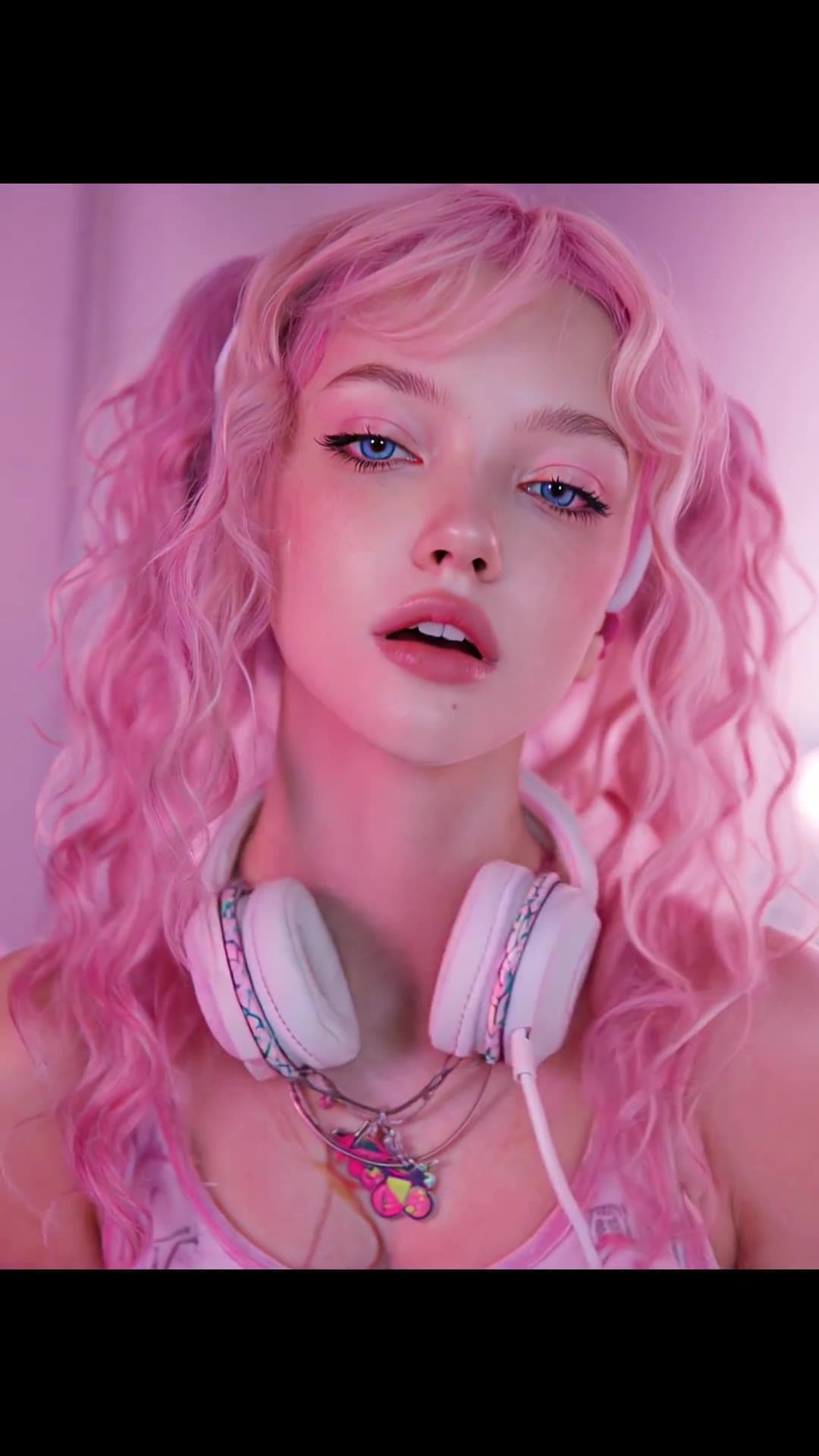 Young adult neon selfie close-up
