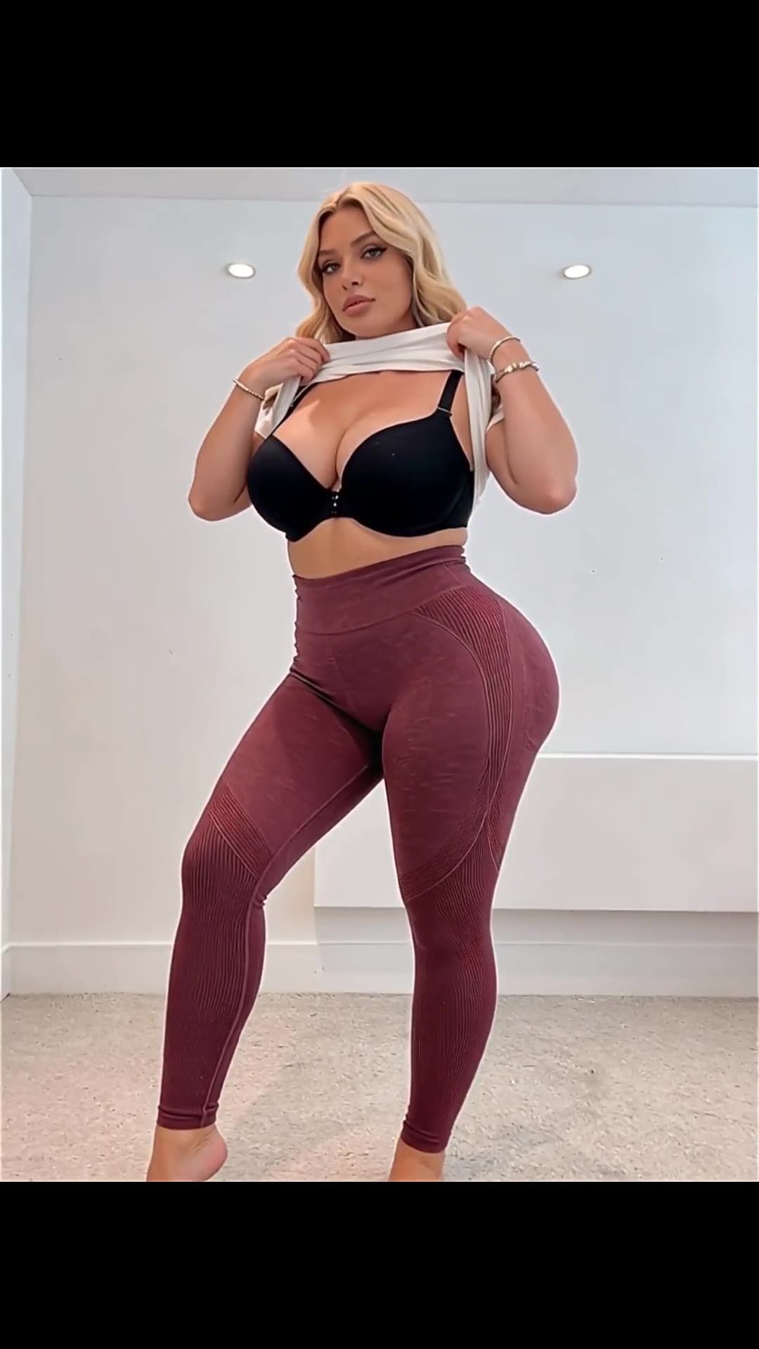 Curvy blonde lifts crop top