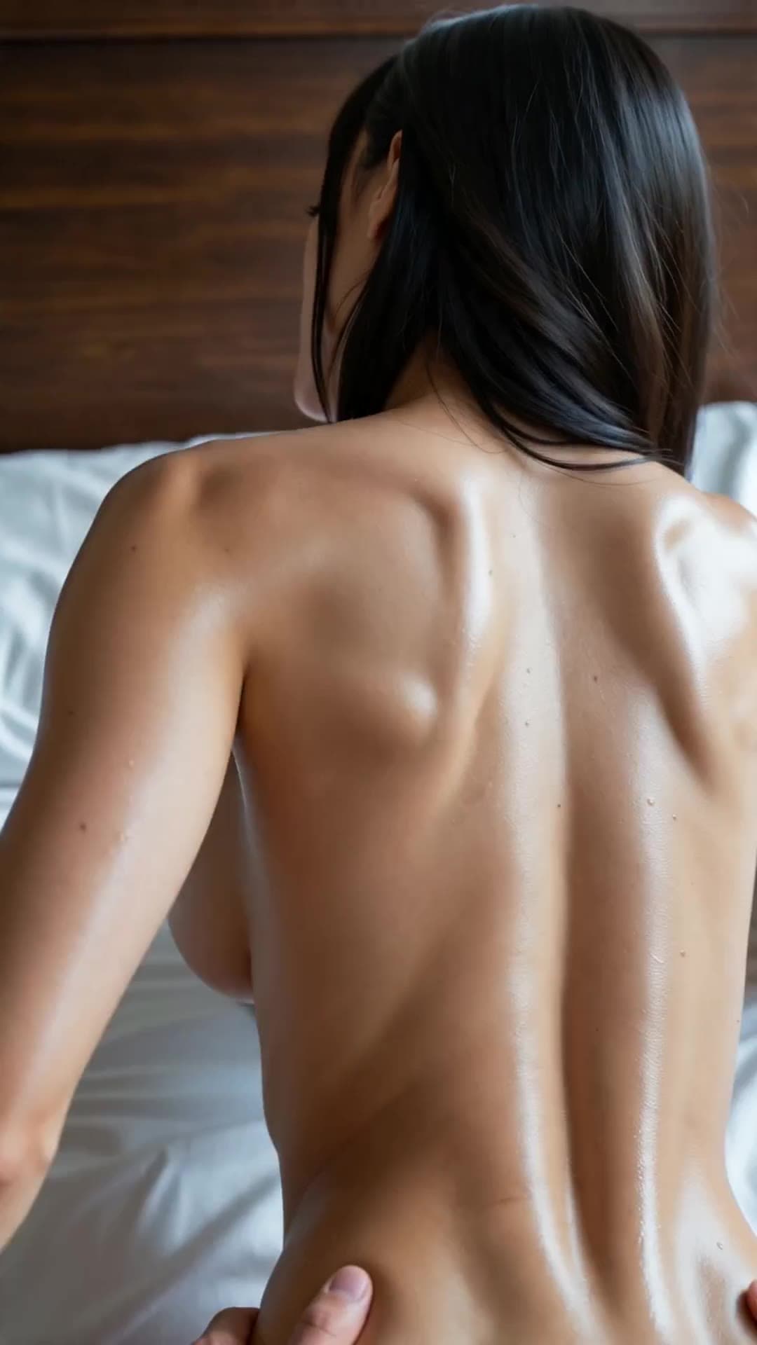 Oiled curvy back and ass on bed