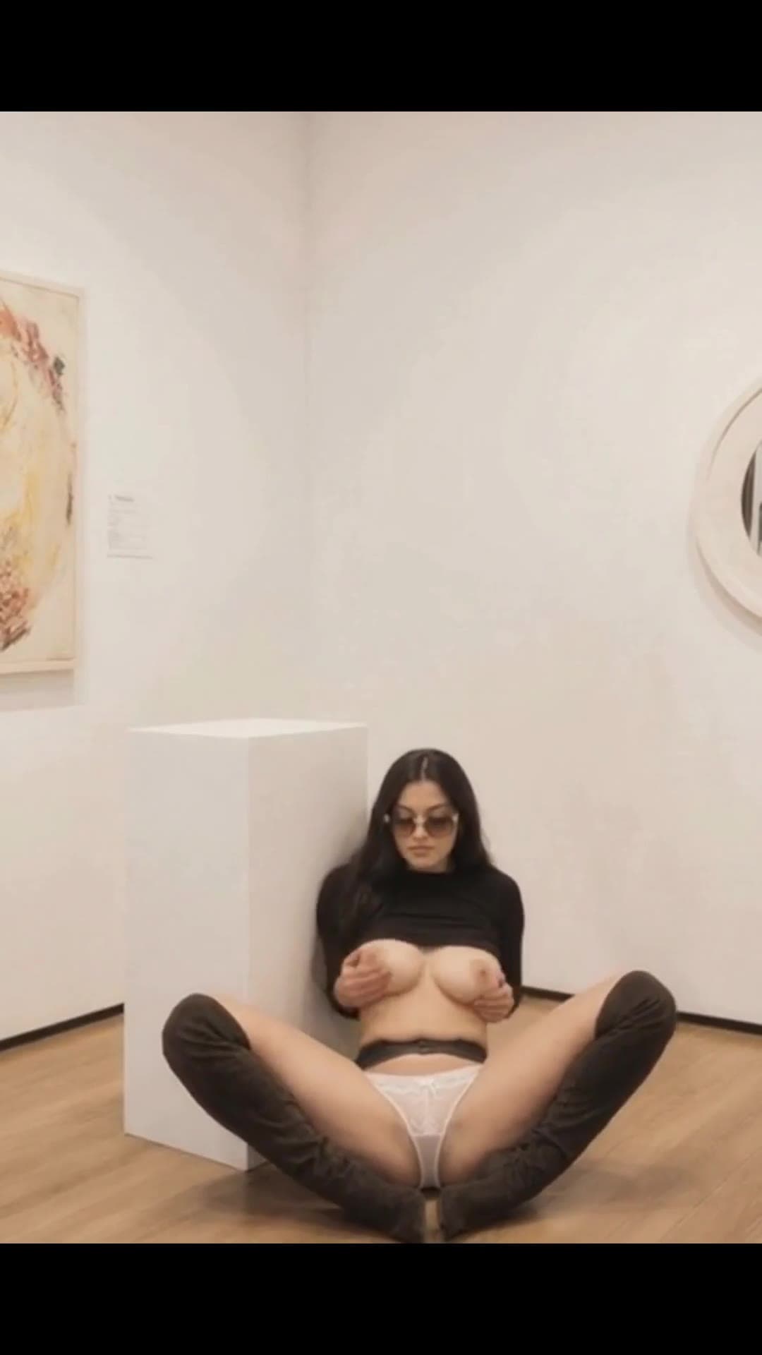 Big natural tits on gallery floor