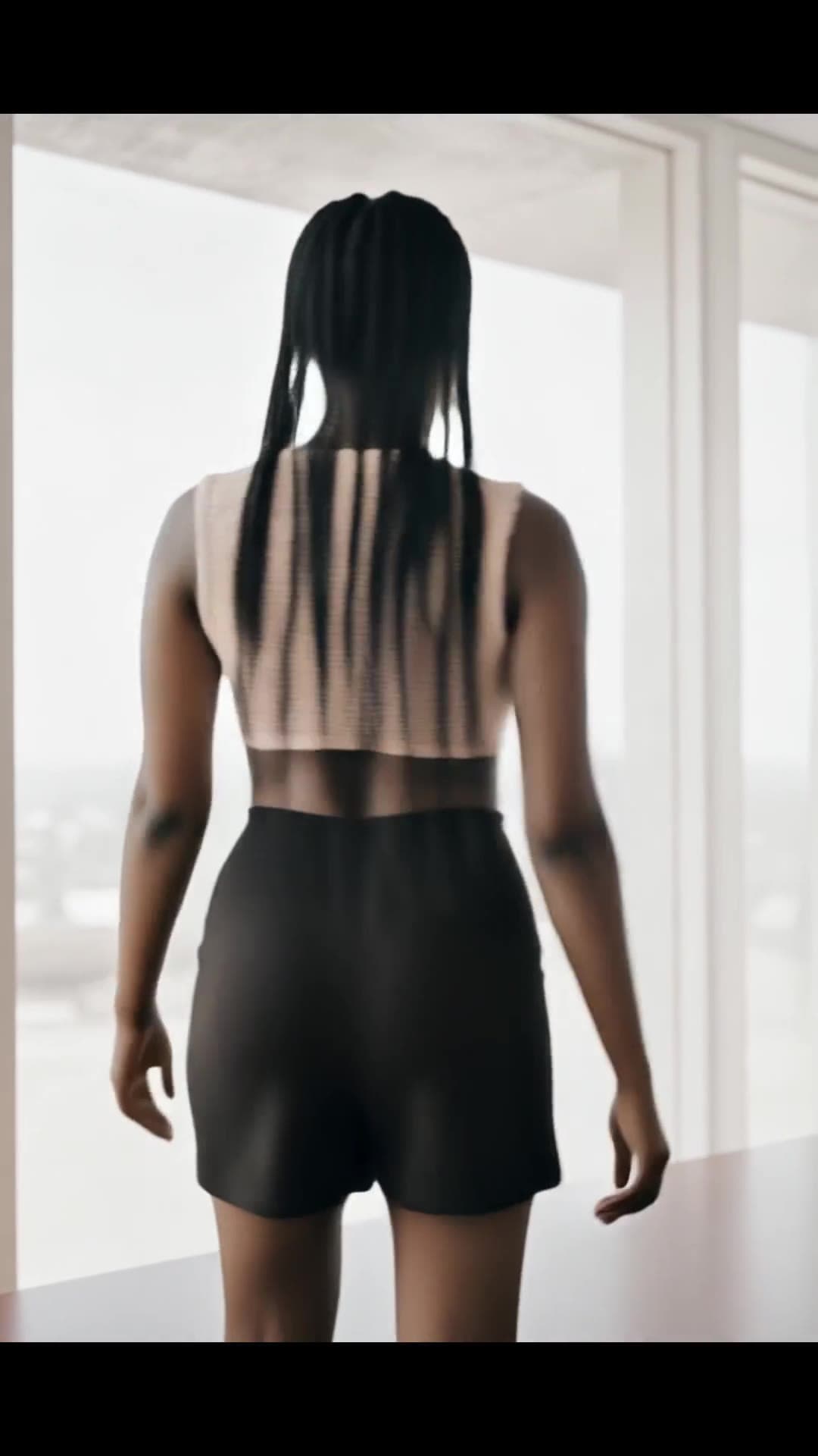 Athletic Asian in sheer crop top and shorts