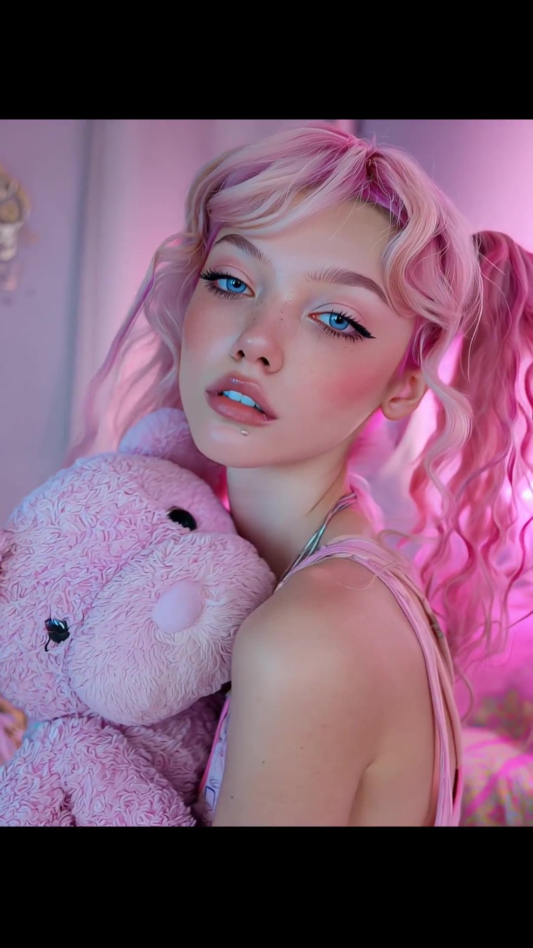 Pink pigtails selfie with teddy bear