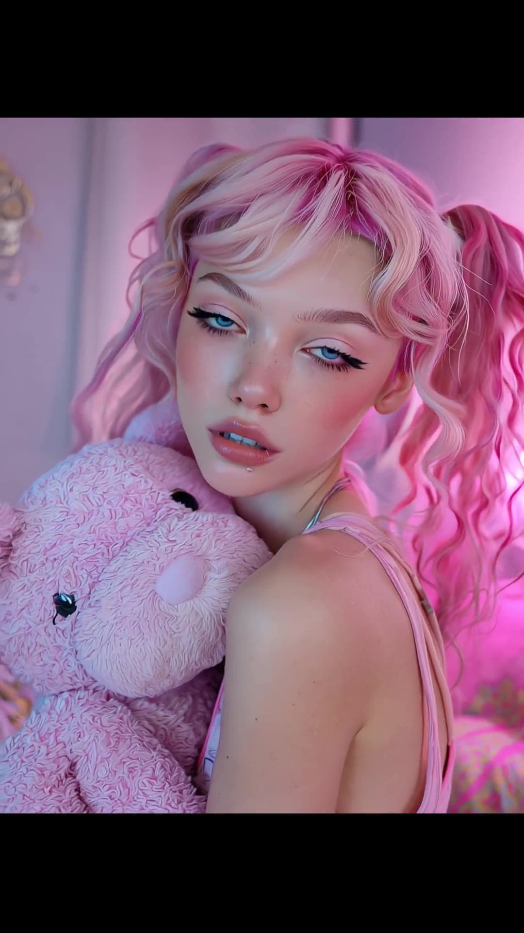 Pink pigtails selfie with teddy bear