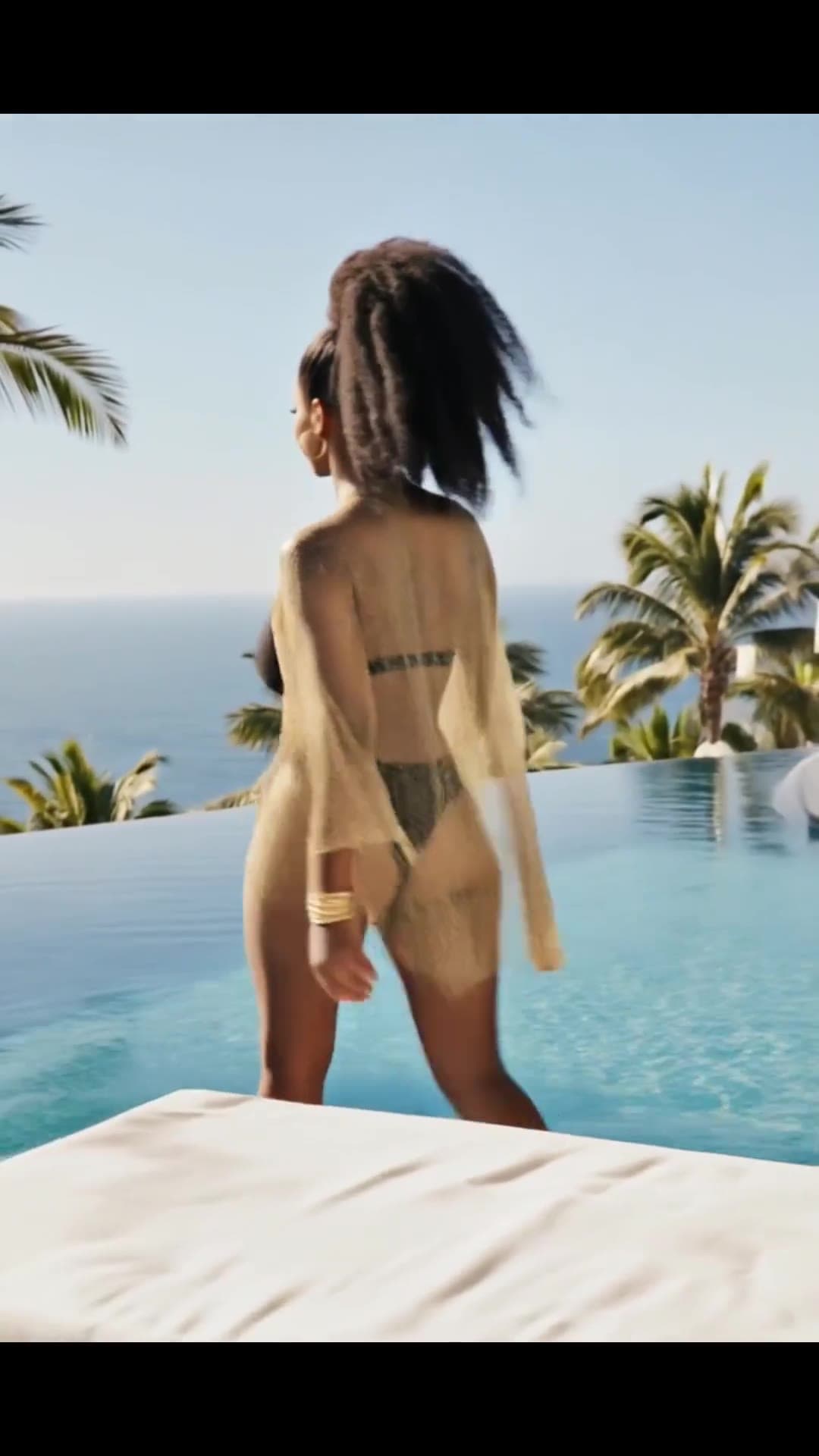 Curvy bikini body by infinity pool
