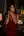 Slim brunette in red satin dress Vegas suite