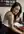 Bare breast at office desk