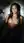 Brunette reclines in bath looking up
