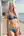 Blonde in beach house doorway