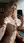 Nude selfie in sunlit study
