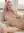 Pink hair nude legs spread on couch
