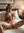 Redhead fingers wet pussy on bed