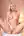 Nude blonde fingers herself on bed