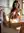 Slim nude on kitchen counter