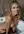 Blonde in bathtub topless