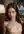 Topless brunette robe drop close-up