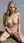 Blonde blue eyes nude on wet sand