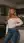 Curvy blonde kitchen sweater pose
