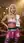 Blonde gym girl crop top pose