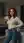 Young redhead in cream sweater