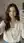College brunette selfie in linen shirt