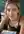Blonde leaning over classroom desk