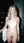 Nude balcony city lights pose
