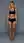 Blonde studio sports bra pose