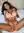 Curvy brunette squirts on bed