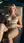 Curvy blonde nude on terrace lounger