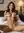 Nude Latina fingers herself on bed