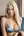 Platinum blonde cleavage on blue couch