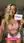 Blonde kitchen cleavage selfie with sign