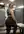 Curvy blonde over the shoulder gym pose