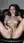Brunette vibrator in office chair