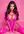 Young Latina squats in pink latex