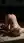 Nude blonde spread on living room rug