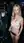 Curvy blonde flashes tongue out in club