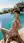 Young adult reverse cowgirl at pool