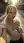 Blonde cleavage selfie on sidewalk