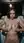 Brunette squeezes breasts in laundry room