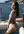 Slim brunette ass on yacht deck