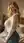 Curvy blonde bedroom sweater look back