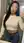 Vivi undressing tease bedroom photo
