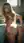 Young adult nude in laundry room