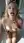 Nude blonde on bathroom floor