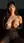 Raven hair, nude breast squeeze