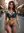 Low angle city street lingerie pose