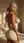 Young blonde bedroom dress pose