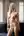 Early 20s nude blonde standing